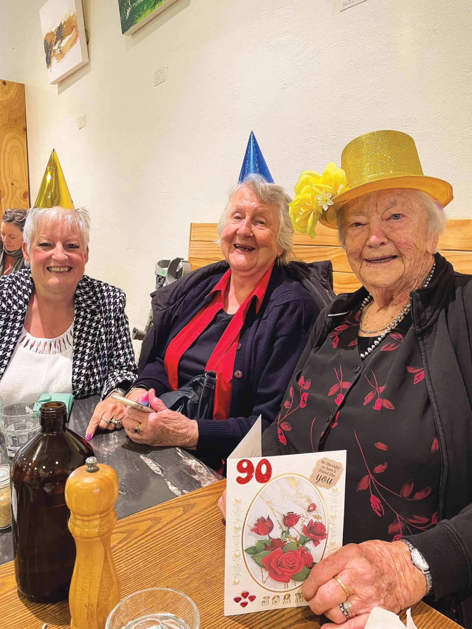 Joan (right) on her 90th birthday.