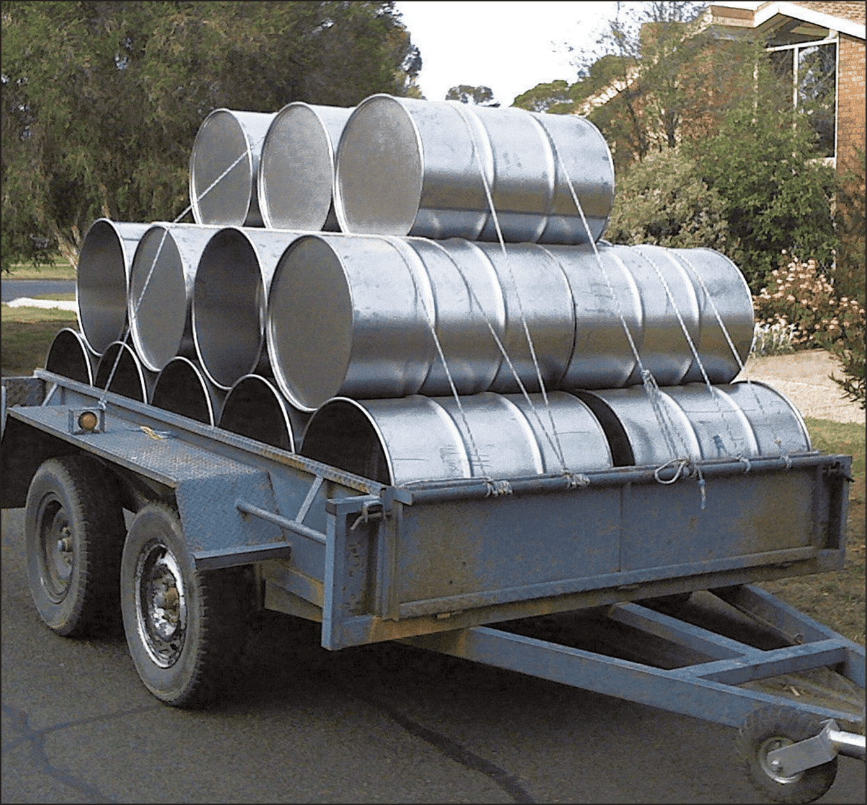 Raw 44-gallon drums in 2009, before their conversion to steelpans.