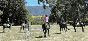 Annabelle, Jess, Jess, Belinda and Elissa being briefed prior to their jumping lesson. -S