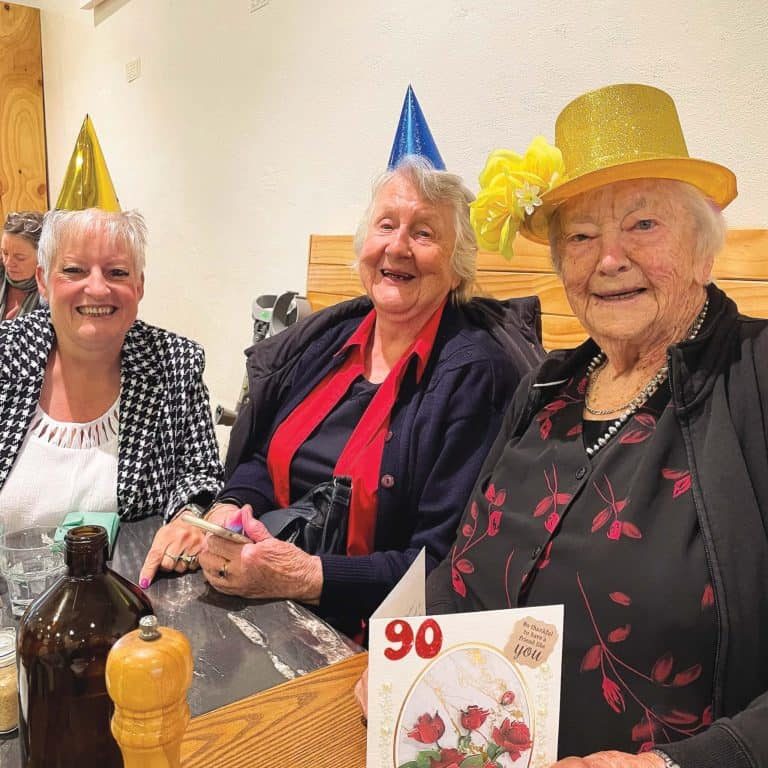 Joan (right) on her 90th birthday.